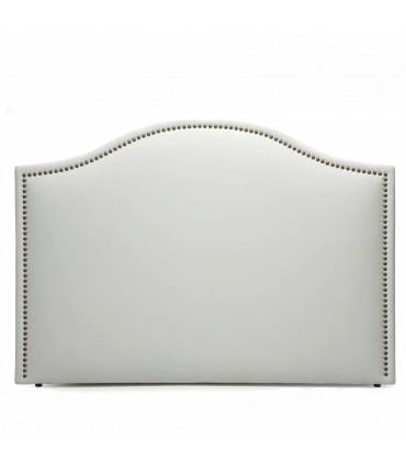 Cabecero tapizado de color blanco en estilo clásico con tachuelas.
